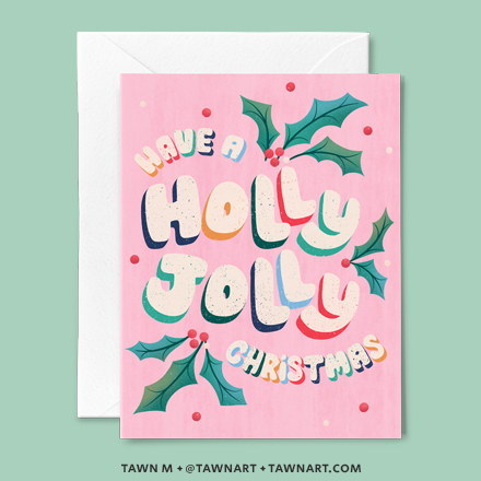 Christmas card with bold hand lettering, winter foliage & berries on pink. Caption: Have a holly jolly Christmas.