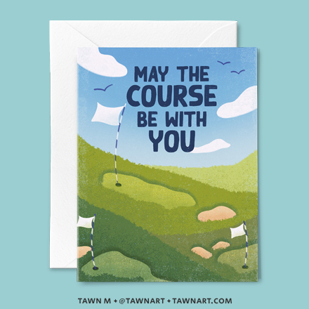 Birthday greeting card of a lush green golf course with a fairway, sand trap, and flag in the distance, under a clear blue sky. Caption: May the course be with you.